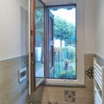 finestra-legno-alluminio-bicolore-aperta