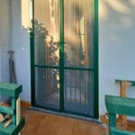 porta-finestra-con-zanzariera-acciaio